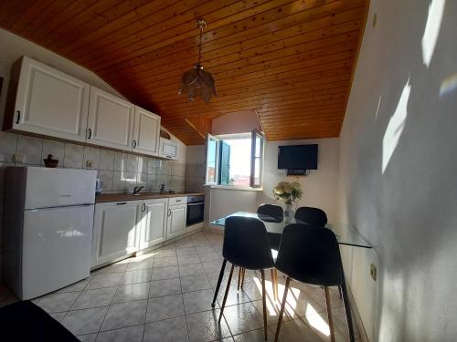Kuchyň nebo kuchyňský kout v ubytování Apartments Dalmatia