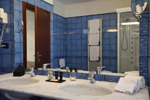 Ванна кімната в Hotel Raffaello