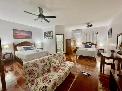 Postel nebo postele na pokoji v ubytování Agoho Resort
