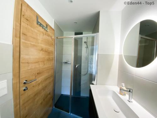 a bathroom with a shower and a sink at Eden 44 - Top 5 in Tamsweg