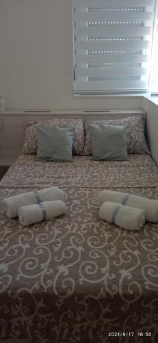 Katil atau katil-katil dalam bilik di Emili Apartman