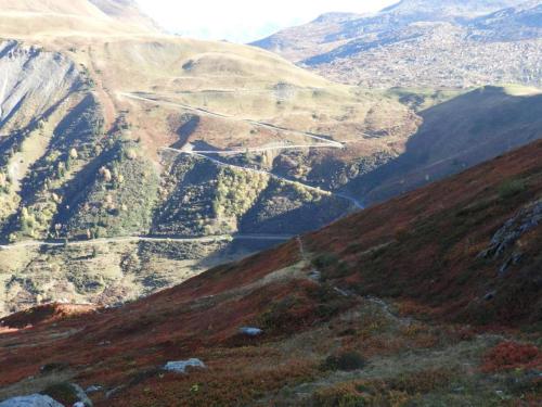 a view of a mountain with a road on it at Auberge du Glandon in Saint-Colomban-des-Villards