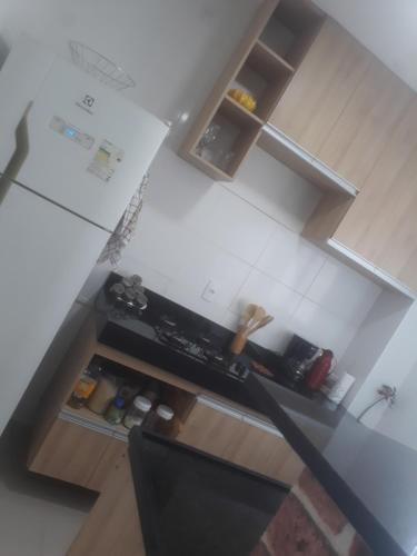 Kitchen o kitchenette sa Apartamento em Cuiabá