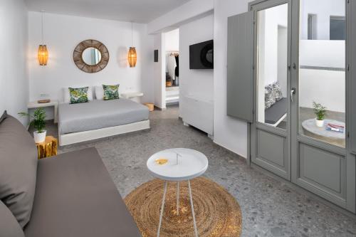 Postel nebo postele na pokoji v ubytování Seven Suites