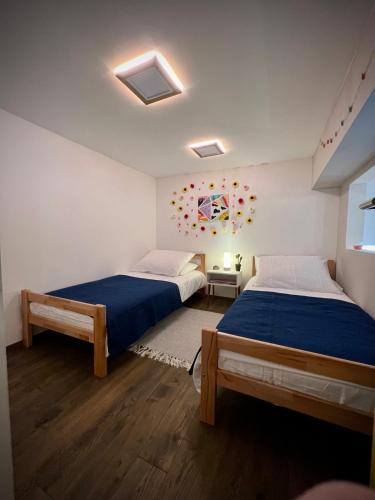 Katil atau katil-katil dalam bilik di Apartman Cvjetni