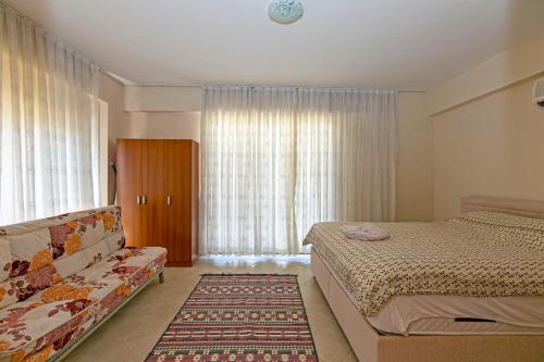 Postel nebo postele na pokoji v ubytování Paradise Town Villa Daisy