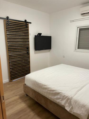 Llit o llits en una habitació de BALCONY HATMARIM