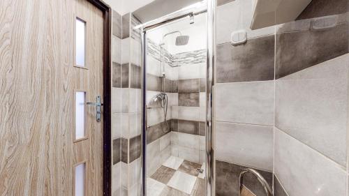 Ett badrum på Apartament Dubaj