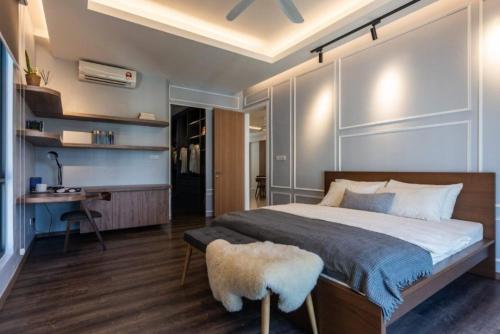 En eller flere senge i et værelse på Petra Villa