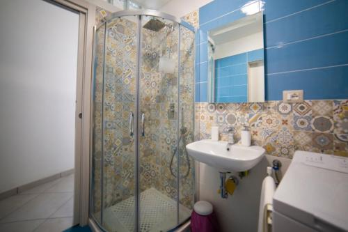 a bathroom with a shower and a sink at ELISA Dependance Centro in Vietri sul Mare