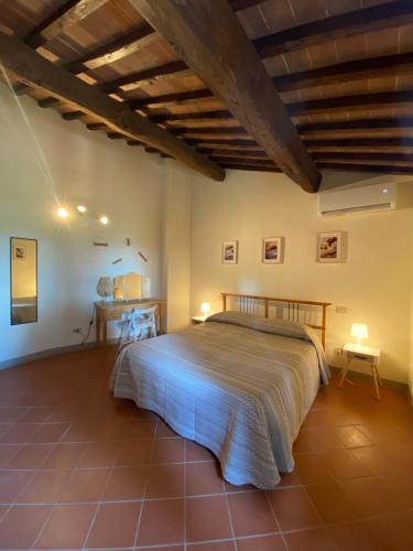 A bed or beds in a room at Montagnana Country House