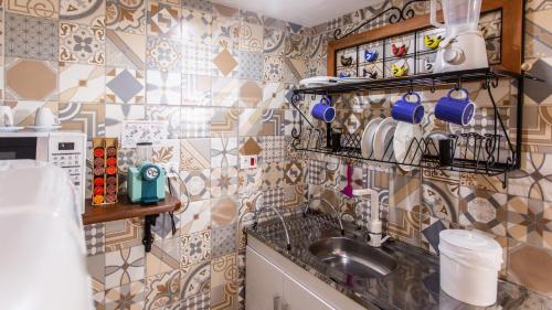 Η κουζίνα ή μικρή κουζίνα στο Hotel Chalet Monet - Granja Vianna