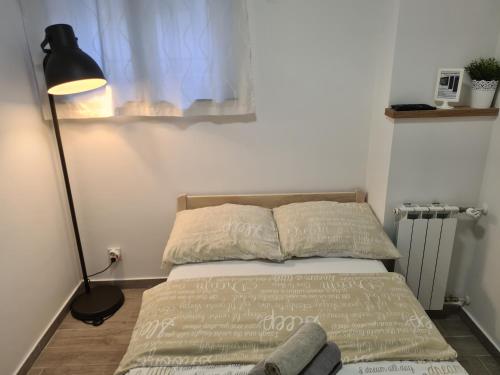 Posteľ alebo postele v izbe v ubytovaní Apartments Lucky Place 2