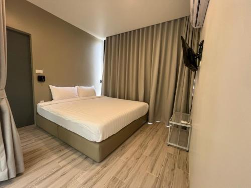 Katil atau katil-katil dalam bilik di Krin Resort
