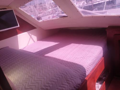 Cama o camas de una habitación en Relax su catamarano