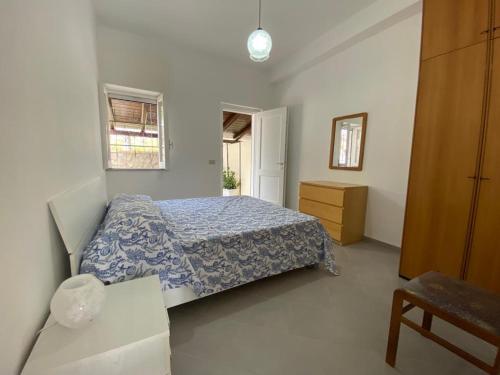 Un ou plusieurs lits dans un hébergement de l'établissement Appartamento Fiordaliso
