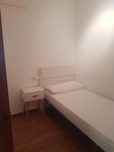 Cama o camas de una habitación en Apartamento Puerto Blanes