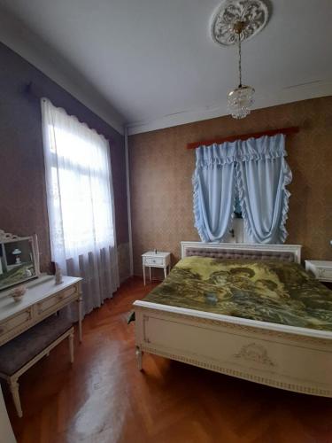 Katil atau katil-katil dalam bilik di Приятный отдых за городом