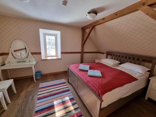 Voodi või voodid majutusasutuse Sepikoja Guest House toas