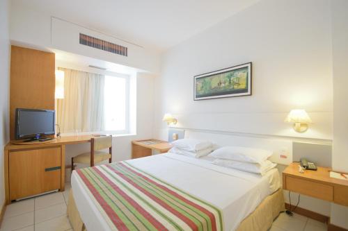 Cama o camas de una habitación en Oasis Atlantico Fortaleza