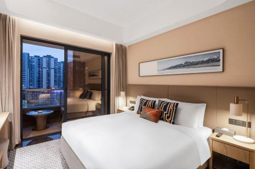Katil atau katil-katil dalam bilik di Primcasa Chengdu