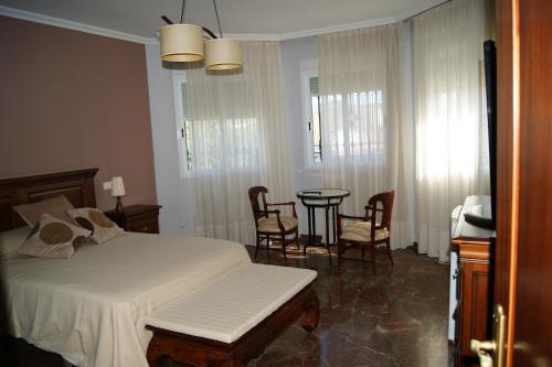 A bed or beds in a room at Villa Coco