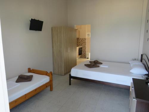 Postel nebo postele na pokoji v ubytování George rooms