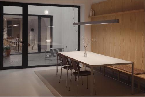 a dining room with a table and some chairs at HOTEL LA FONDA B&B in Tarazona de Aragón