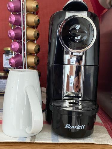 a black and white coffee maker sitting on a counter at Rowan House B&B Rooms & A Self Catering Apartment in Lochgoilhead