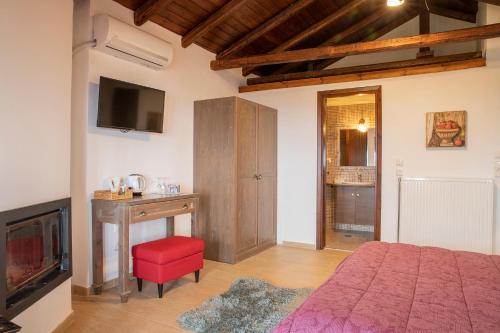 Μια τηλεόραση ή/και κέντρο ψυχαγωγίας στο Guesthouse Ourania