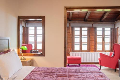 Ένα ή περισσότερα κρεβάτια σε δωμάτιο στο Guesthouse Ourania
