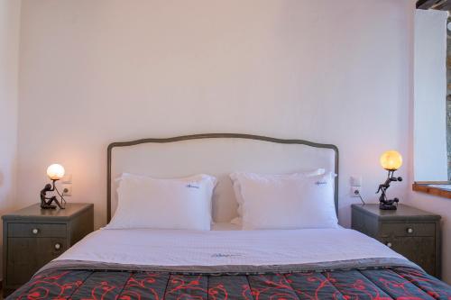 Ένα ή περισσότερα κρεβάτια σε δωμάτιο στο Guesthouse Ourania