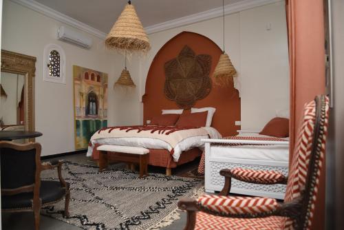 מיטה או מיטות בחדר ב-Dar Yomma