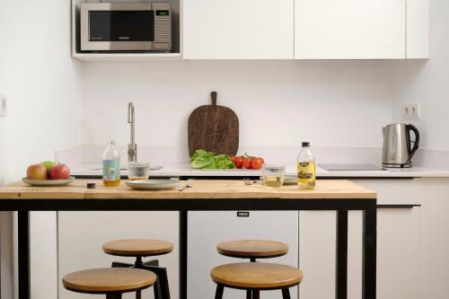Η κουζίνα ή μικρή κουζίνα στο Eco Boutique Hostal Grau