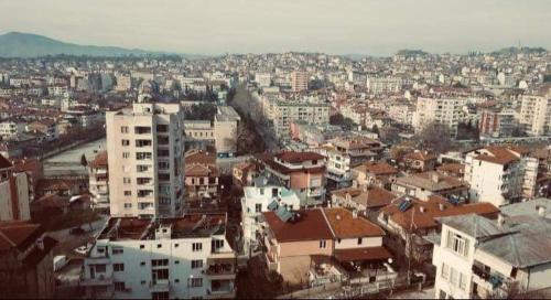 a view of a city with buildings and houses at Guest House Sofia in Sandanski