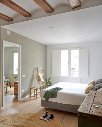 Ένα ή περισσότερα κρεβάτια σε δωμάτιο στο Eco Boutique Hostal Grau