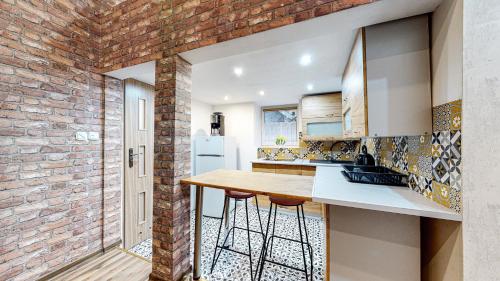 Fotografia z galérie ubytovania LOFT MANHATTAN DE LUX CENTRUM DWORCOWA v destinácii Bytom