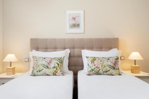 Posteľ alebo postele v izbe v ubytovaní Ivory Luxury Suite by CorfuEscapes