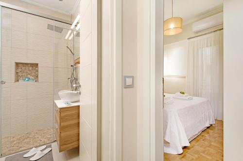Kúpeľňa v ubytovaní Ivory Luxury Suite by CorfuEscapes