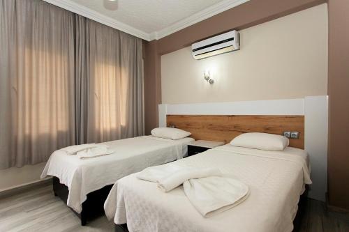 Krevet ili kreveti u jedinici u okviru objekta Green Peace Hotel