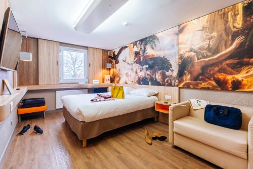 Postel nebo postele na pokoji v ubytování Ibis Styles Lille Marcq En Baroeul
