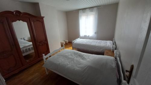 Katil atau katil-katil dalam bilik di Gîte albertin
