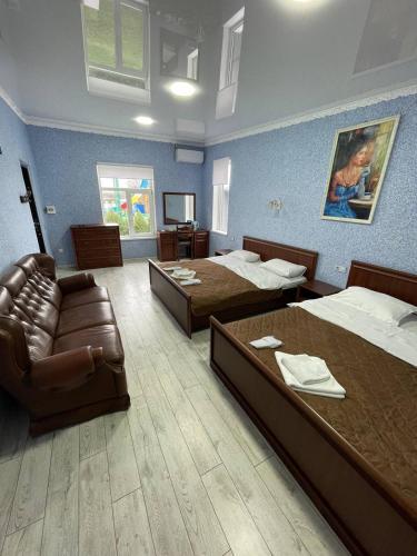 Ένα ή περισσότερα κρεβάτια σε δωμάτιο στο Hotel Lux Aquapark