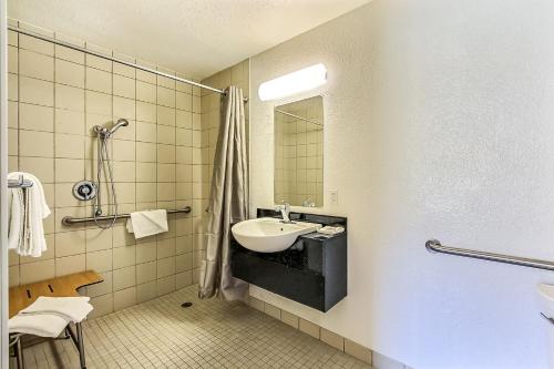 a bathroom with a sink and a mirror at Motel 6-Fremont, CA - North in Fremont