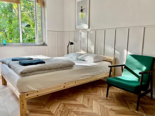 A bed or beds in a room at Letnisko