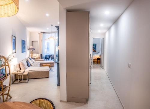 a living room with a couch and a table at Apartment Nobilis in Zambratija