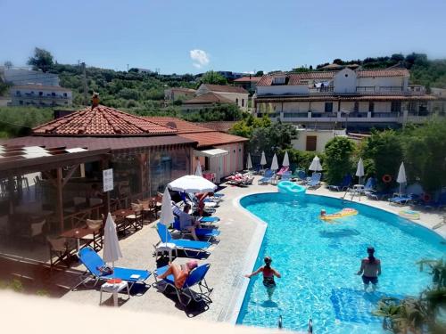 a view of a swimming pool at a resort at Daphne Studios in Tsilivi
