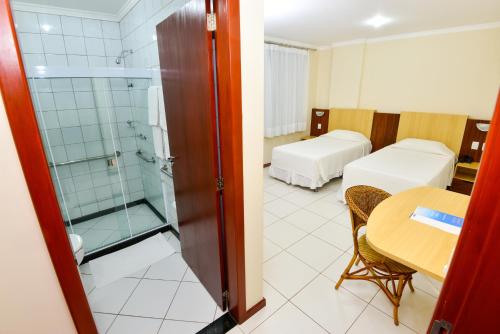 Postel nebo postele na pokoji v ubytování Hotel Plaza Mar