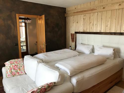 Posteľ alebo postele v izbe v ubytovaní Pension Wolkenreich