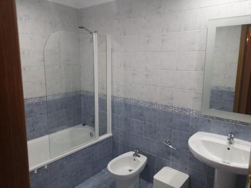 a bathroom with a sink and a toilet and a tub at Javea: Apartment/ flat - Jávea in Jávea